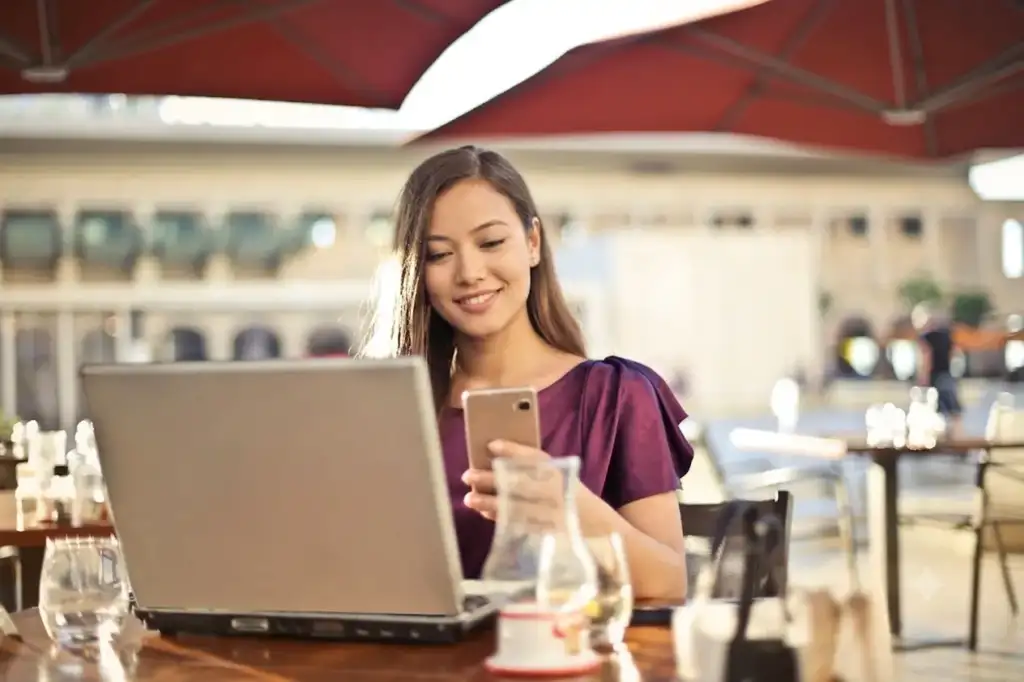 Freelance SEO professional working on laptop at a café in Nepal